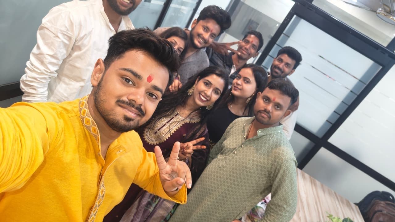 TradeAura students and staff in a festive Ganesh Chaturthi group selfie